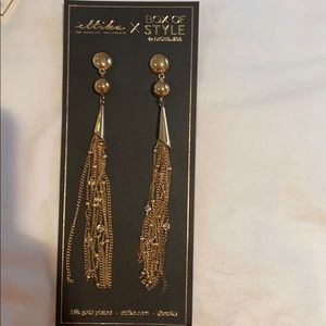 Gold tassel earnings